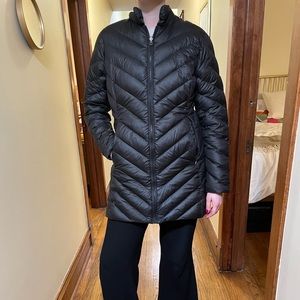 Large black Patagonia puffer jacket with detachable waterproof layer